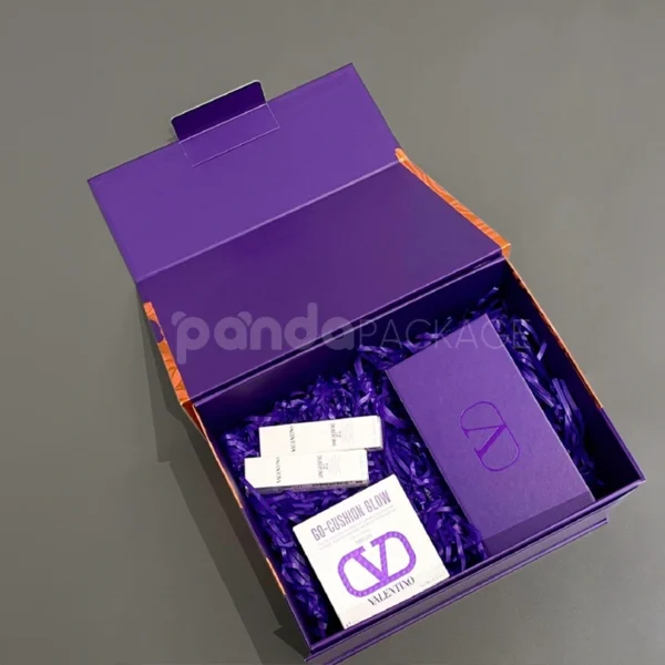 Bold Purple Gift Box with Orange Rope Tassel Accents