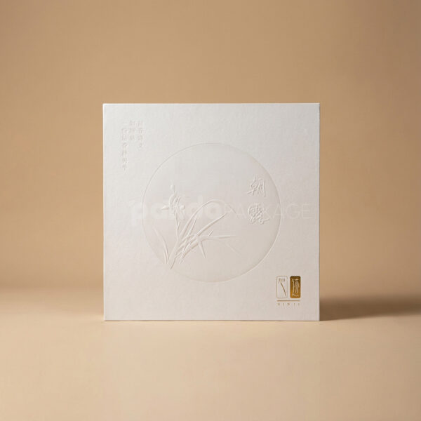 Elegant White Gifting Box with Fan-Inspired Presentation