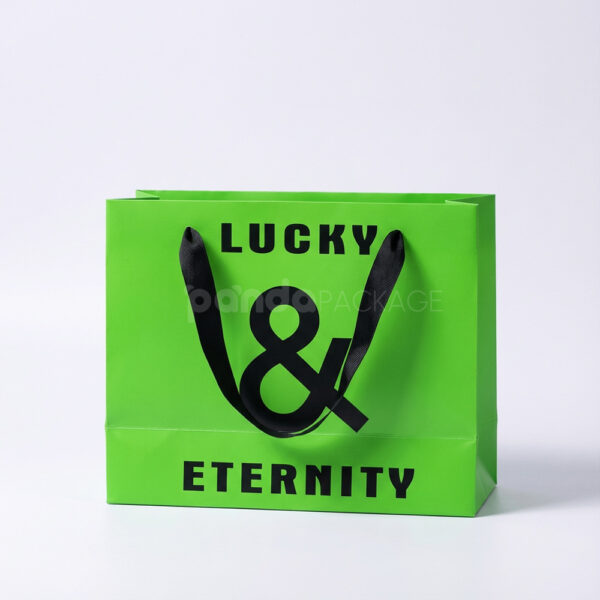 Vibrant Green Gift Bag with Bold Typography