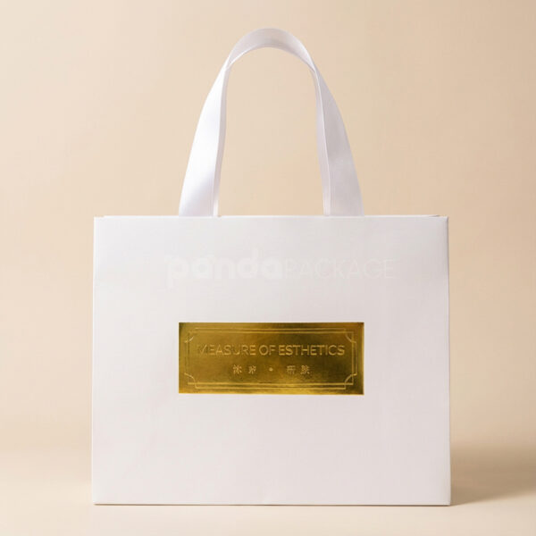 Minimalist White Gift Bag with Gold Foil Logo