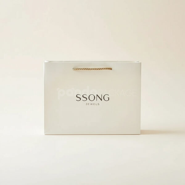 Cream Gift Bag with Gold Ribbon Handles