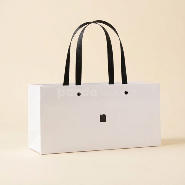 Elegant White Gift Bag with Square Logo Detail