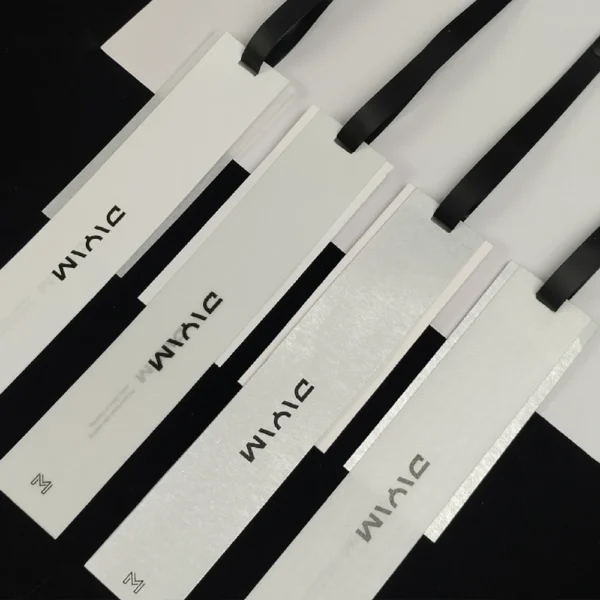 Slim White Hang Tags with Embossed Black Lettering