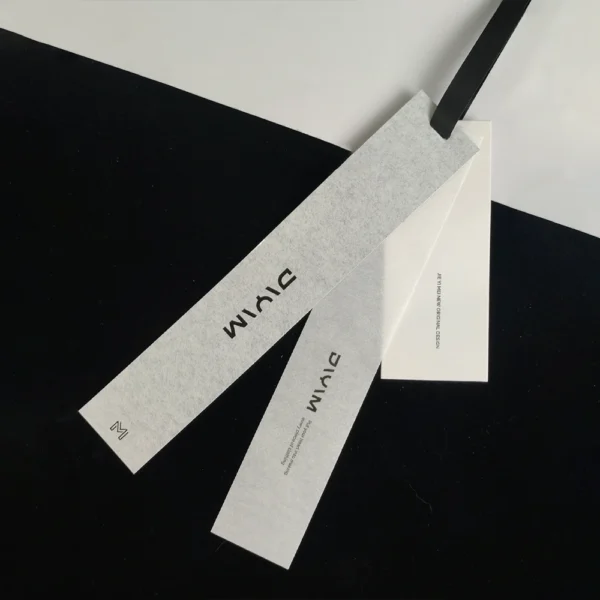 Slim White Hang Tags with Embossed Black Lettering