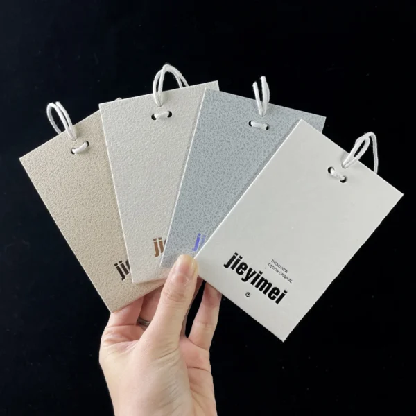 Soft Neutral-Tone Hang Tags with Embossed Logos