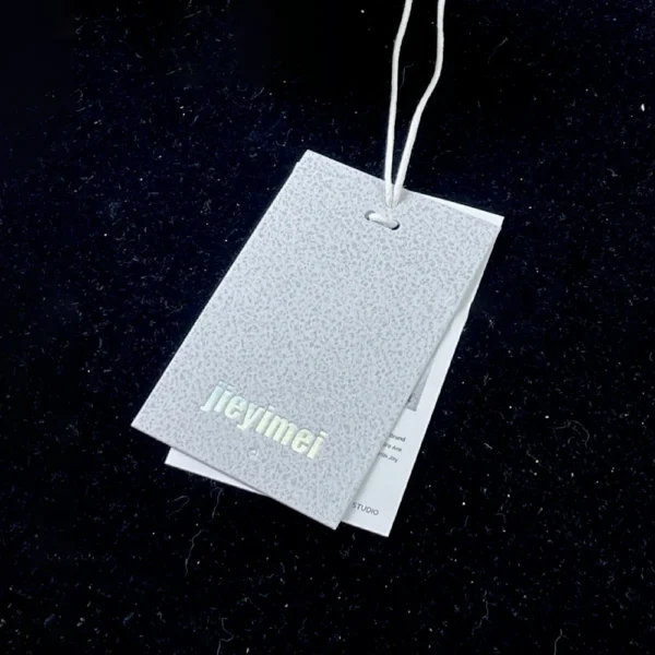 Soft Neutral-Tone Hang Tags with Embossed Logos