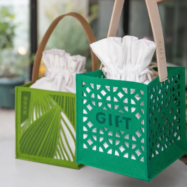 Green Hollow-Out Gift Bag with Bamboo Handle and Insert Base