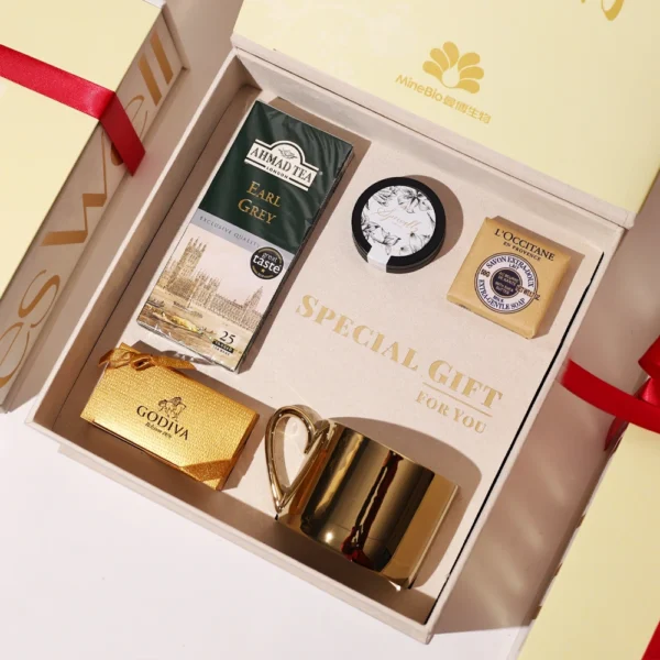 Elegant Cream & Gold Gift Box with Red Ribbon