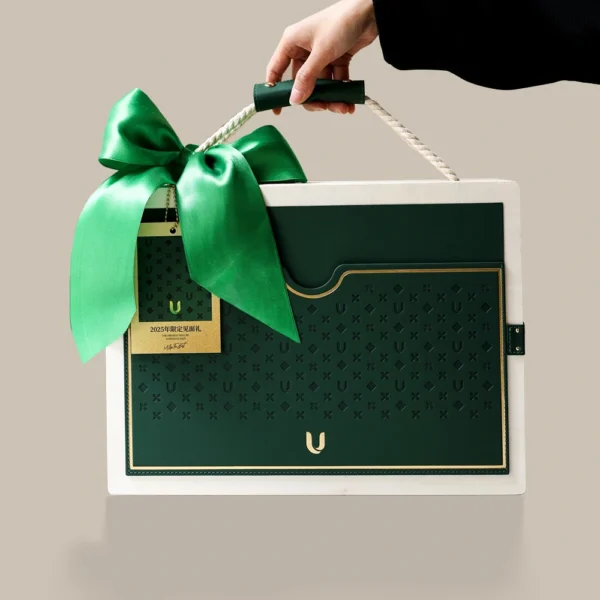 Elegant Green Textured Gift Box with Handle and Ribbon Closure
