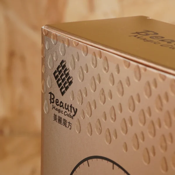 Gold Foil Eye Mask Packaging with Embossed Texture and Minimalist Design