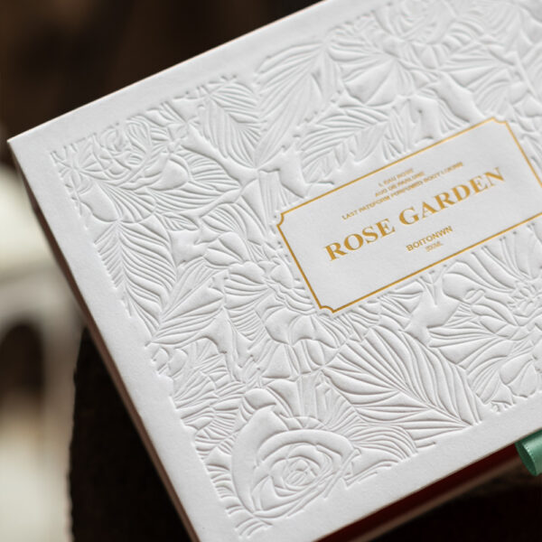 Embossed White and Red Gift Box with Gold Foil