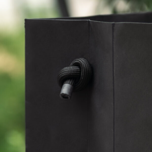 Minimalist Black Paper Bag with Gold Foil Logo