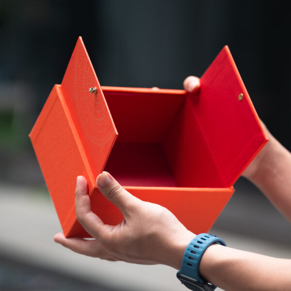 Luxury Orange Gift Box with Circular Embossed Pattern