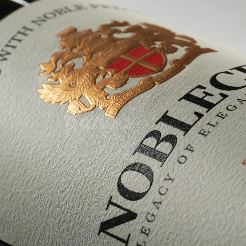 Label Sticker with Embossed Gold Foil Emblem