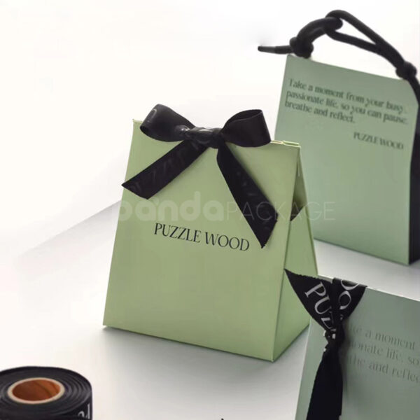 Pastel Green Gift Box with Black Ribbon Closure