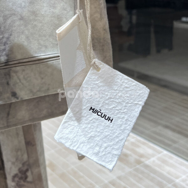 Minimalist Textured Garment Hang Tag with Embossed Logo
