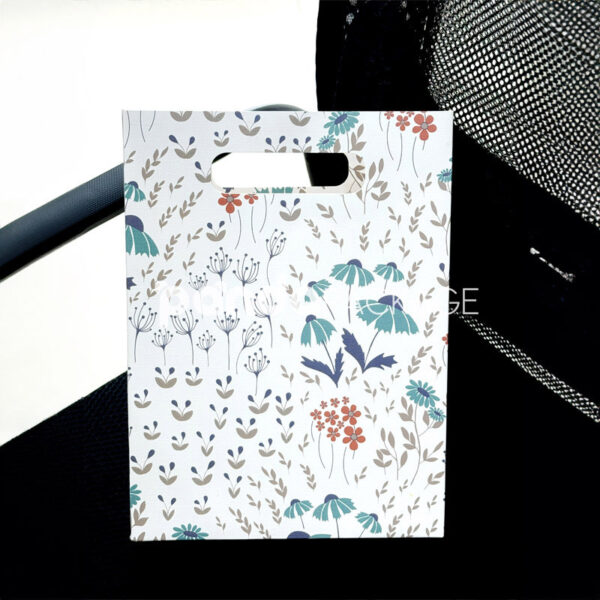 Floral Cut-Out Handle Gift Bag with Nature-Inspired Design