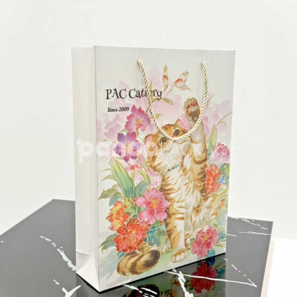 Artistic Cat-Themed Gift Bag with Floral Illustration