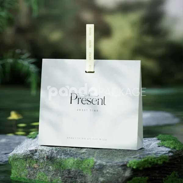 Elegant White Gift Bag with Gold Foil Lettering