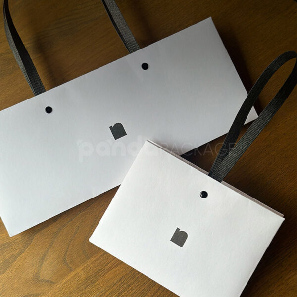 Elegant White Gift Bag with Square Logo Detail
