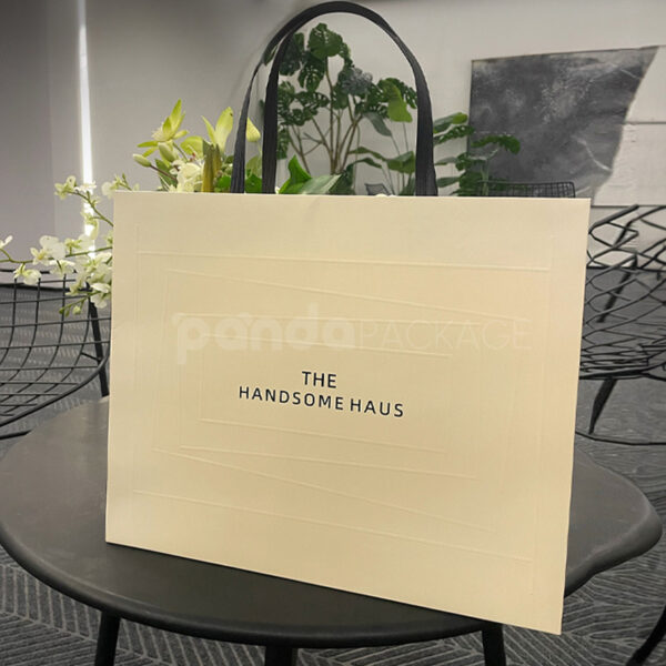 Textured Cream Paper Bag with Black Handle