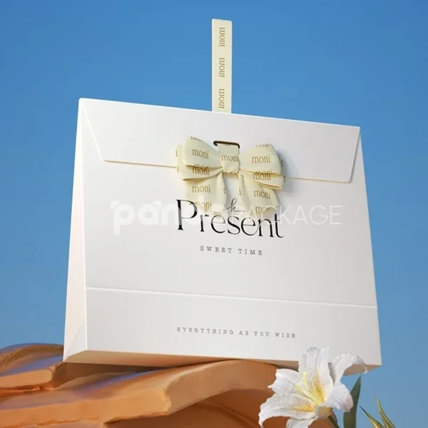Elegant White Gift Bag with Gold Foil Lettering