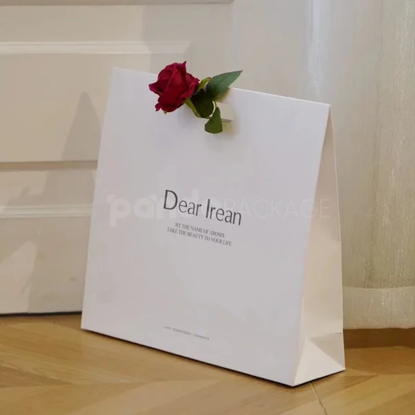Minimalist White Shopping Bag with Built-In Handle