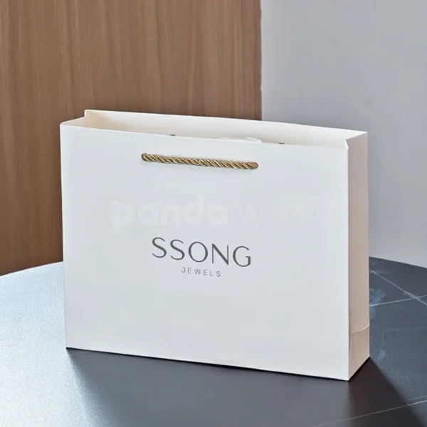 Cream Gift Bag with Gold Ribbon Handles