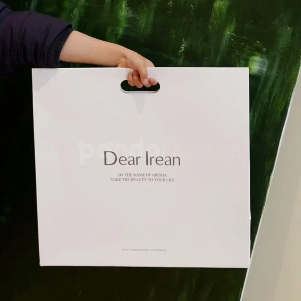 Minimalist White Shopping Bag with Built-In Handle