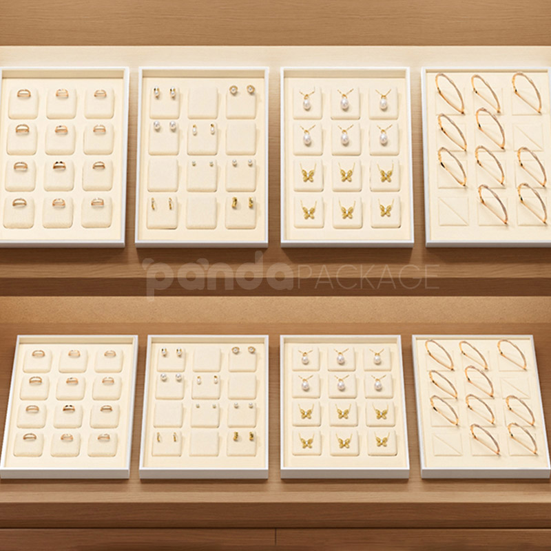 Elegant White Jewelry Display Tray Set with Rings and Necklaces