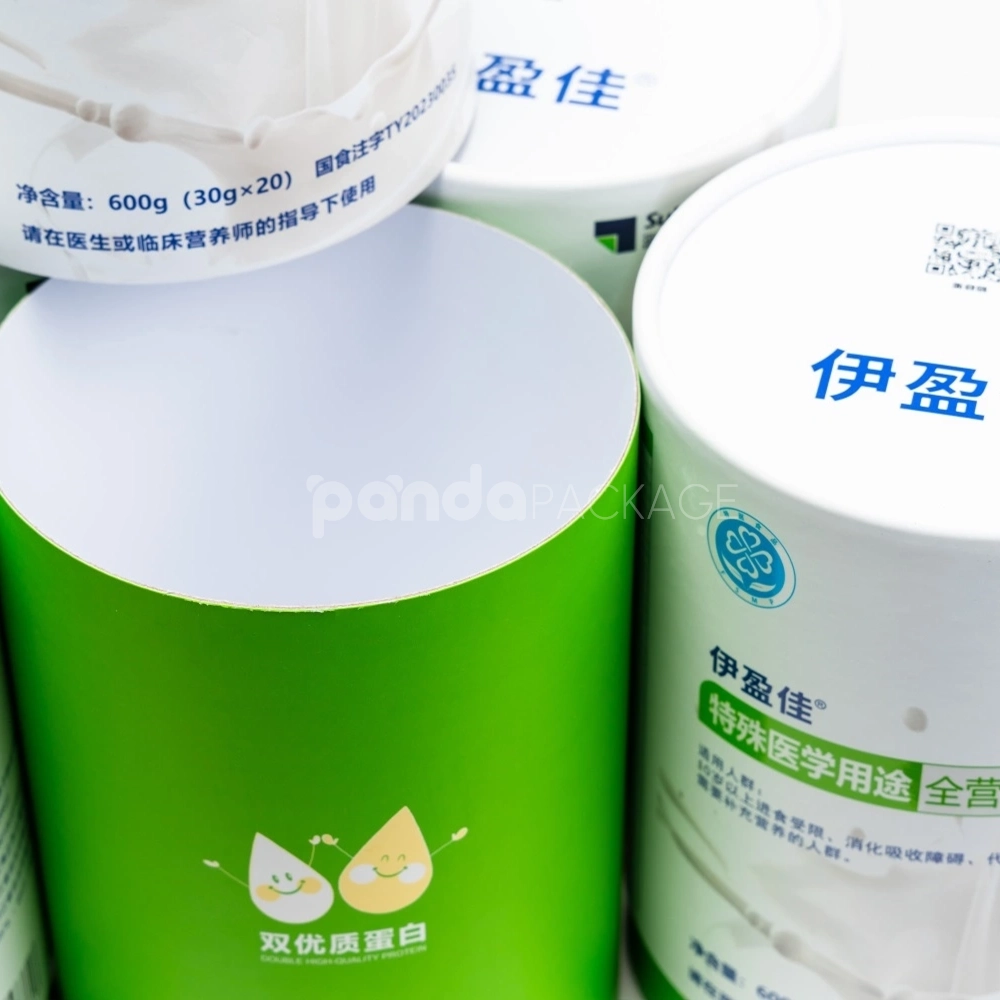 Green and white rigid paper tube for nutritional formula packaging