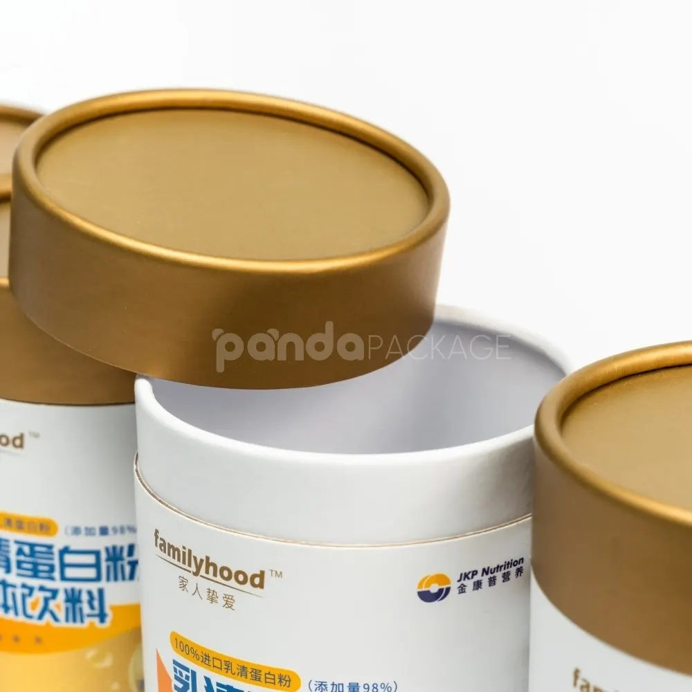 Open food-grade white paper tube with metallic lid
