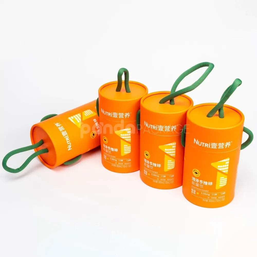 Bright orange paper cylinder with green rope handle for safe food packaging and portable presentation