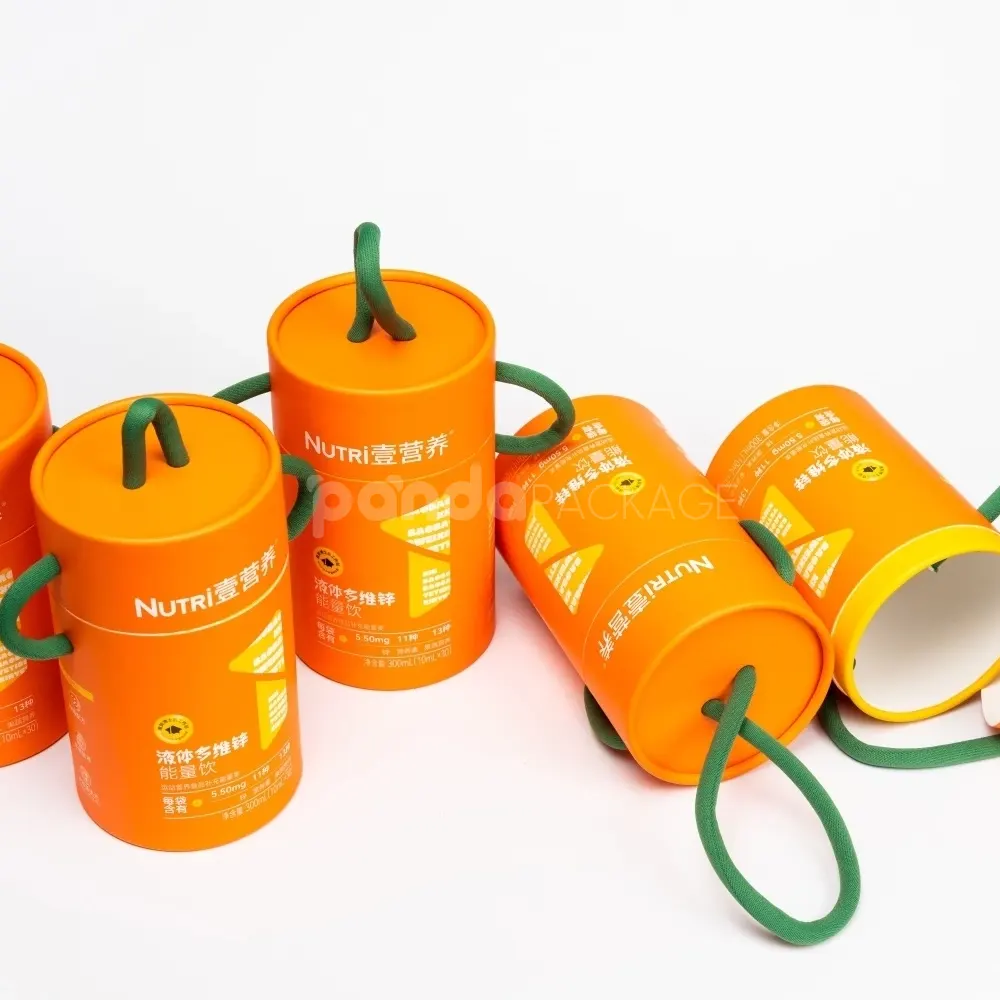 Bright orange paper cylinder with green rope handle for safe food packaging and portable presentation