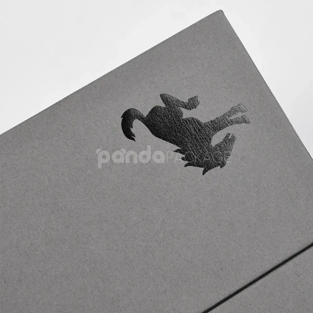 Luxury grey rigid box with lift-off lid and black foil stamped logo