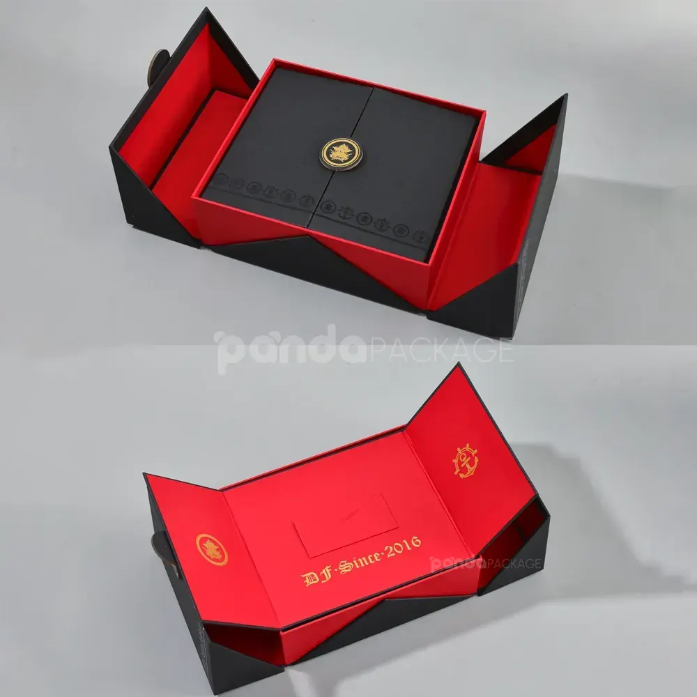 Black double door rigid gift box with gold foil medallion and red interior