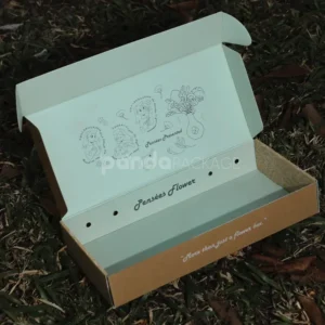 foldable kraft mailer box with printed inner design and handle holes