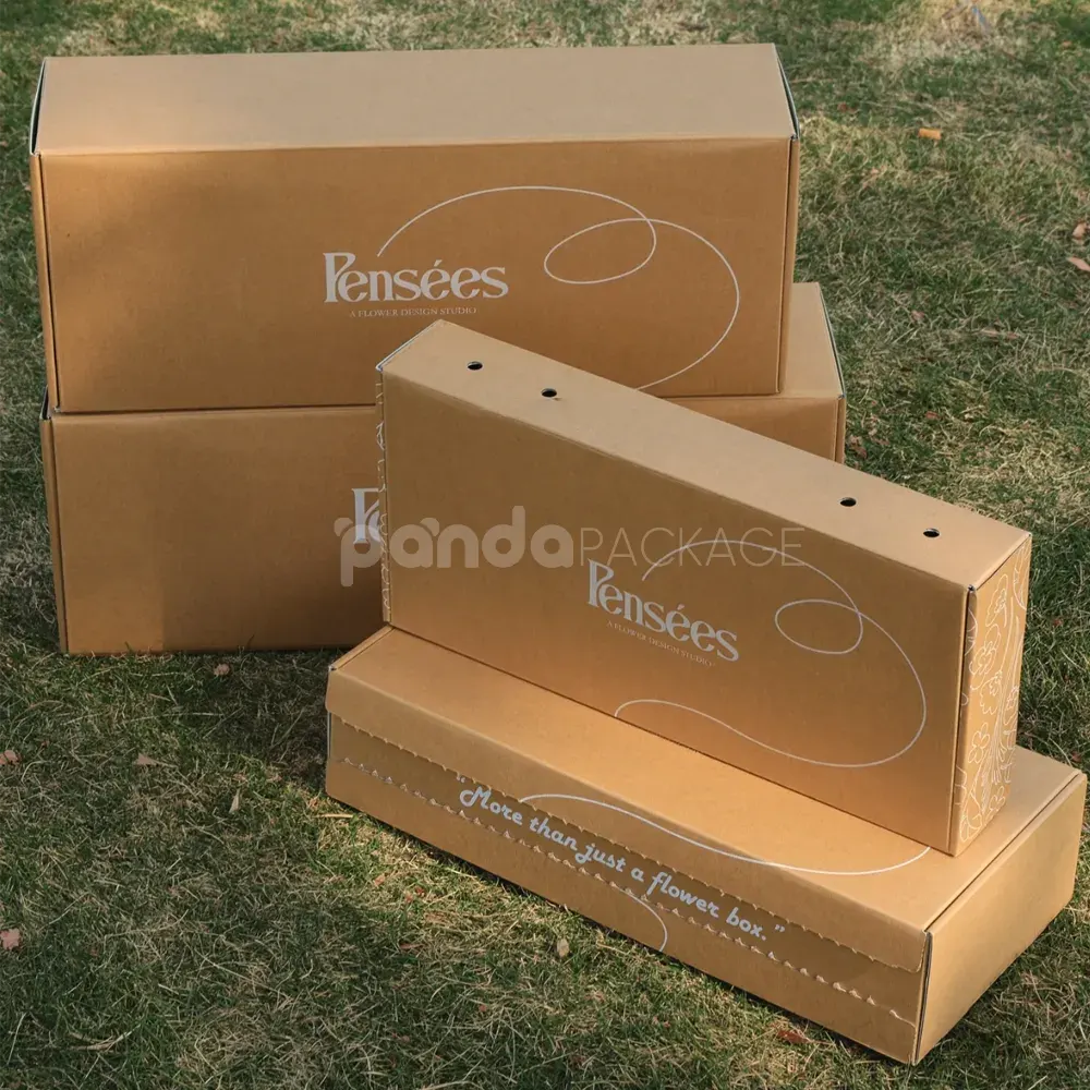 foldable kraft mailer box with printed inner design and handle holes
