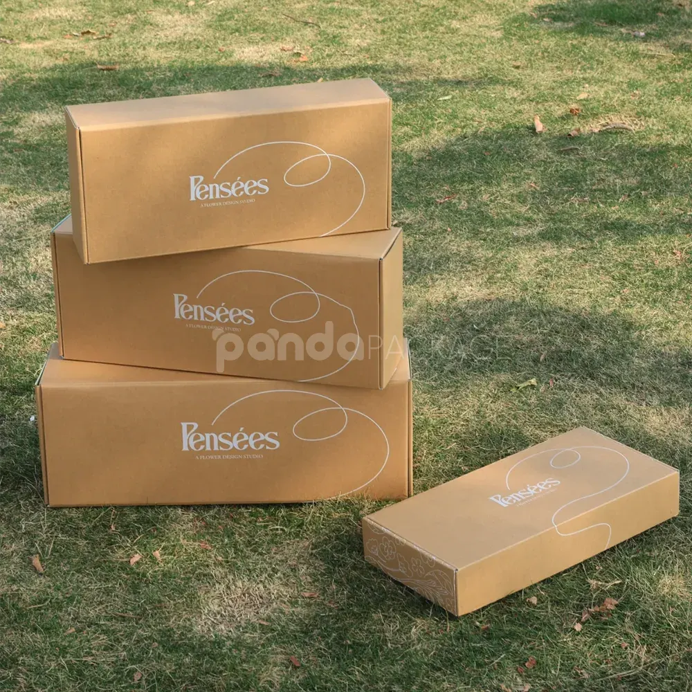 foldable kraft mailer box with printed inner design and handle holes