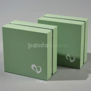 pastel matcha green rigid box with lift-off lid and foil logo