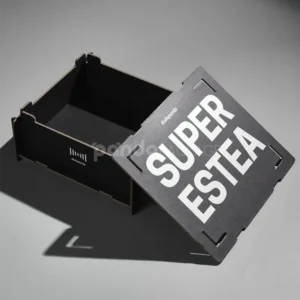 interlocking paperboard box with orange strap and slot-in panels
