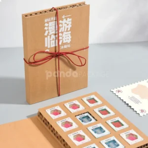 kraft book-style rigid box with flip lid and red tie cord