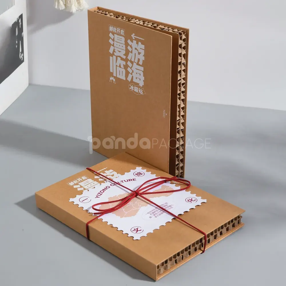 kraft book-style rigid box with flip lid and red tie cord