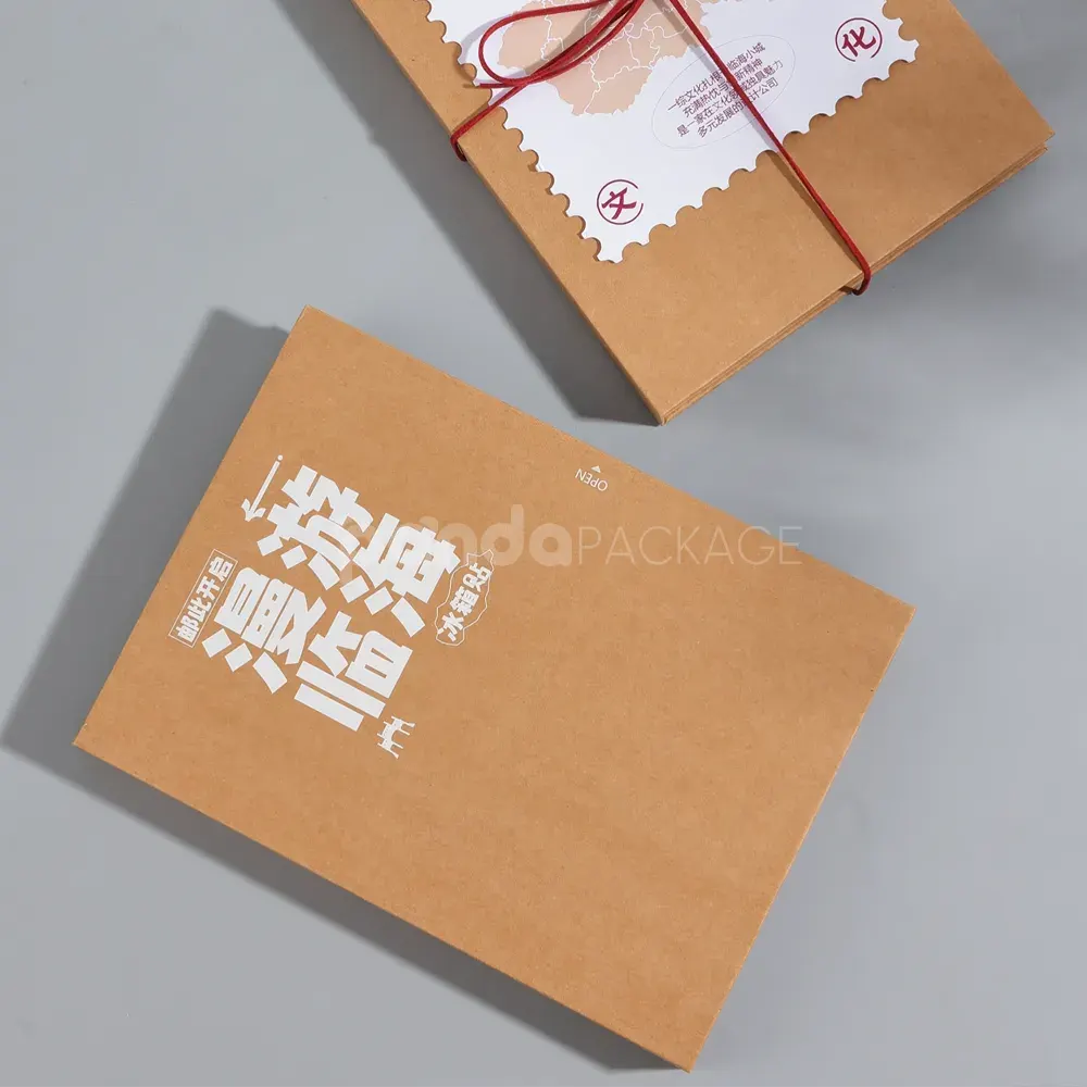 kraft book-style rigid box with flip lid and red tie cord