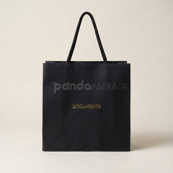Minimalist Black Paper Bag with Gold Foil Logo