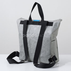 Gray Tyvek paper backpack with bold blue strap