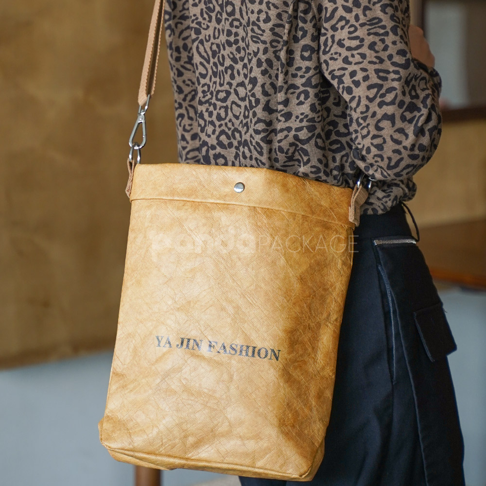 Eco-friendly kraft paper crossbody bag with adjustable strap
