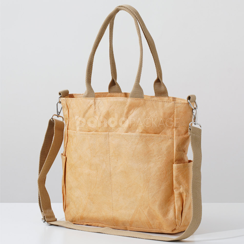 kraft paper tote bag with shoulder strap and side pockets
