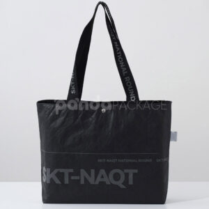 branded black paper bag with long webbing handles