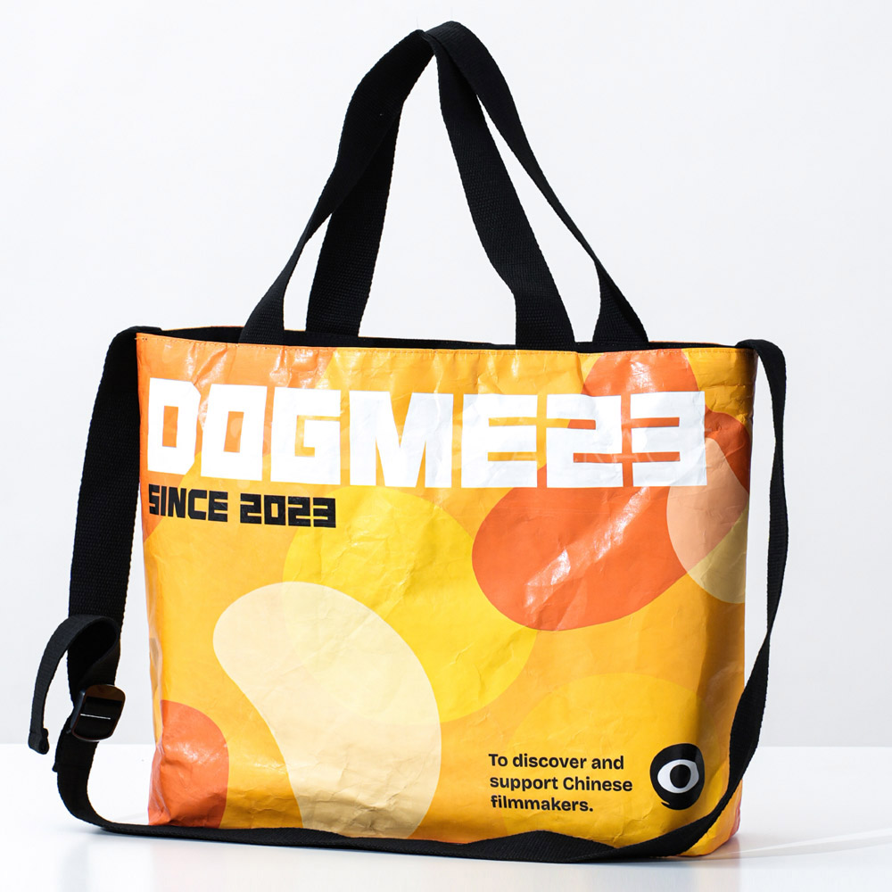 Eco-friendly graphic tote bag with shoulder strap and vibrant print